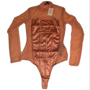 NWT Guess Short Cake Caged Mesh Bodysuit in Light Pink